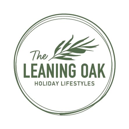 The Leaning Oak Holiday Lifestyles logo